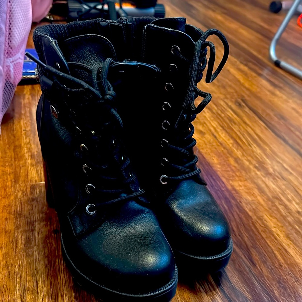 Black combat boots with lace up